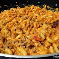 one pot ricotta pasta with elbow macaroni, sauce, and ricotta cheese