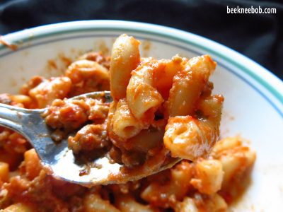 one pot ricotta pasta with elbow macaroni, sauce, and ricotta cheese