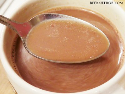 Storage Chef emergency food hot chocolate in a mug with spoon