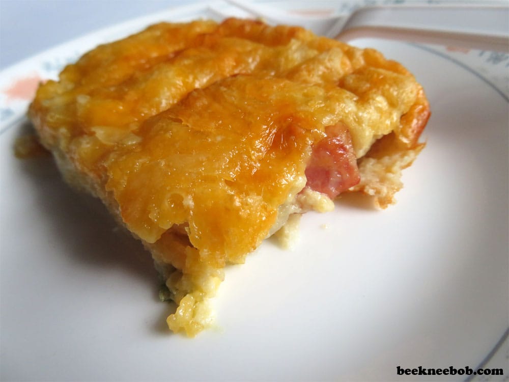 slice of ham, potato, egg, and cheese breakfast casserole for two