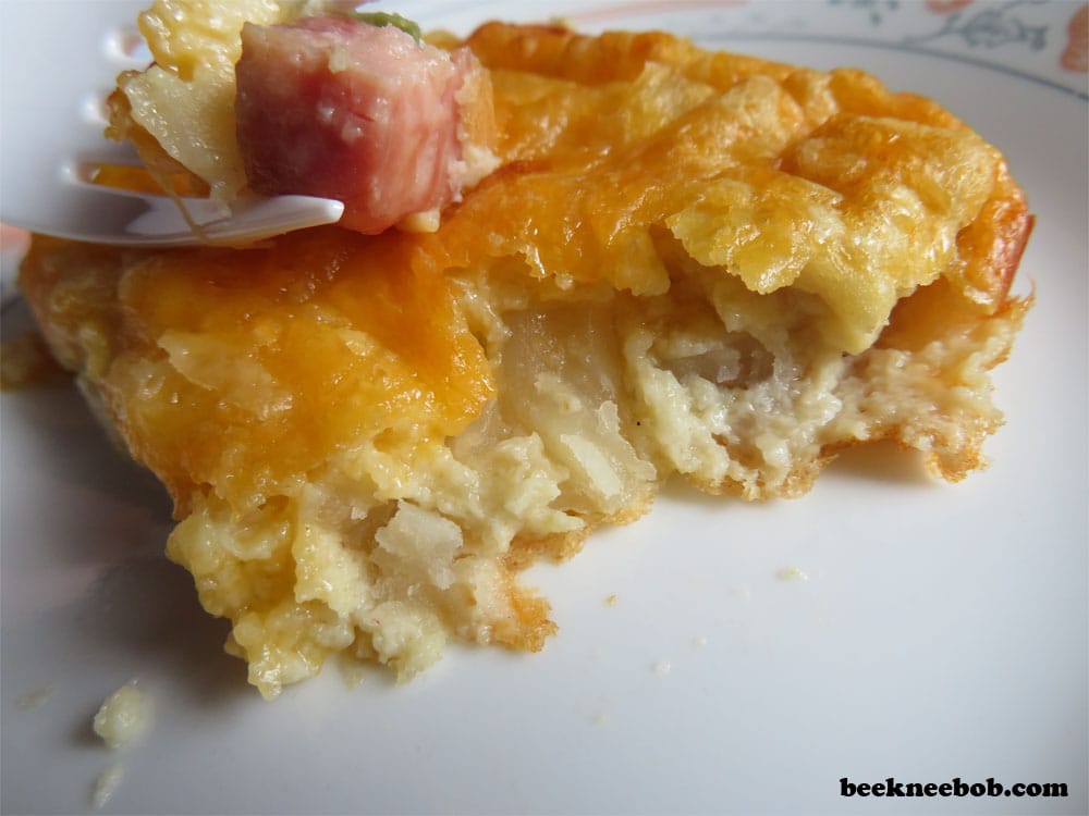 slice of ham, potato, egg, and cheese breakfast casserole for two