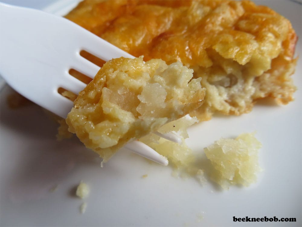slice of ham, potato, egg, and cheese breakfast casserole for two