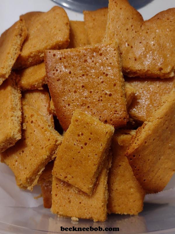 Honey cornbread cookies cut into squares and rectangles