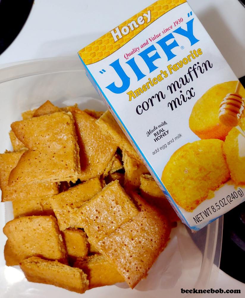 Container of honey cornbread cookies next to box of Jiffy Honey Corn Muffin Mix