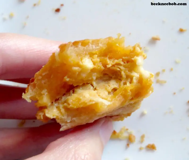 Eaten piece of Hillshire Farm Buffalo Style Chicken Croissant