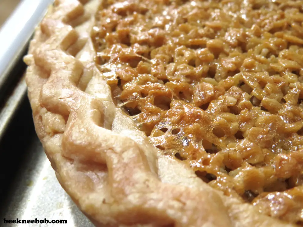 additional close up of a mock pecan pie with crust and glazed oats