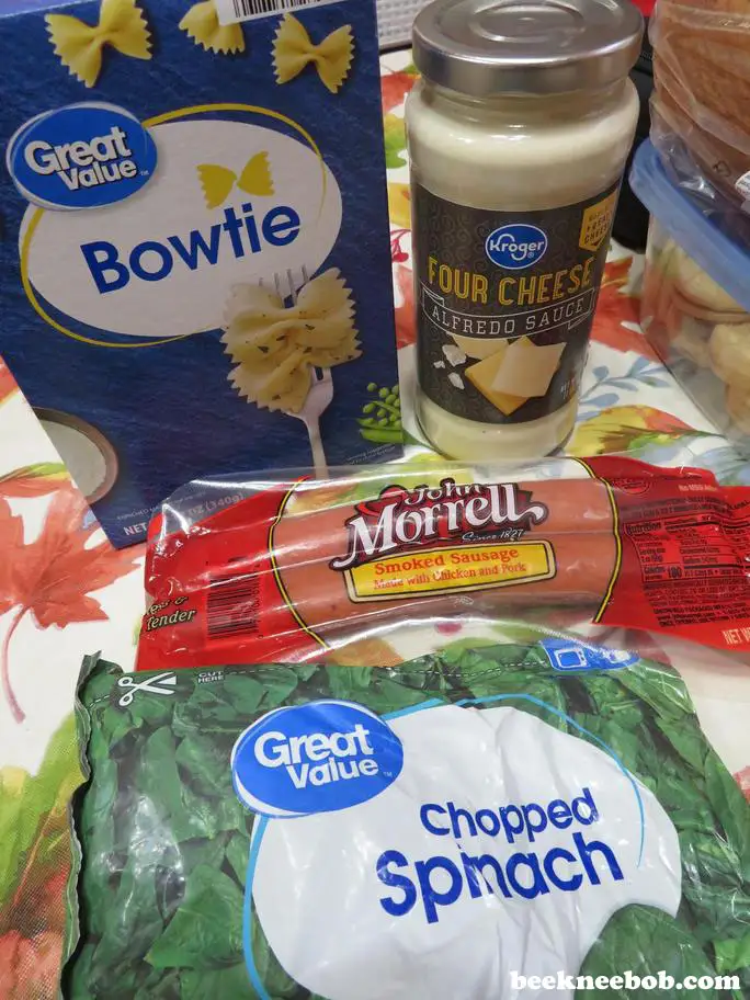 4 ingredients for smoked sausage and spinach alfredo pasta