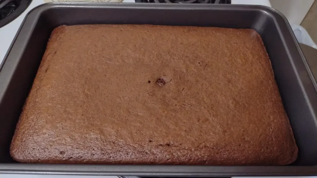 freshly baked chocolate cherry cola soda cake in a 13x9 cake pan