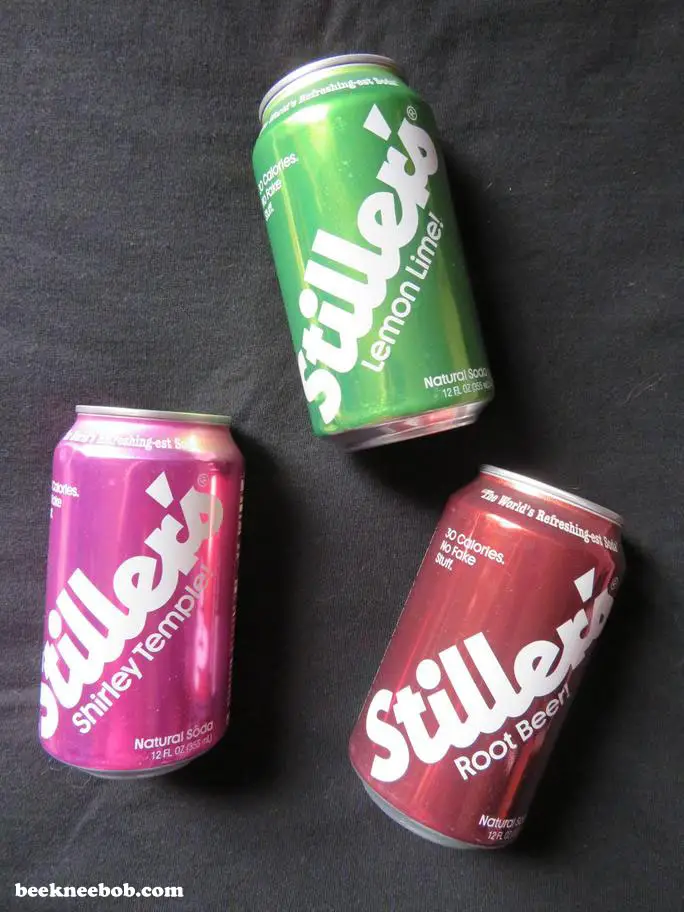 Overhead picture of Stiller's Soda cans in three flavors